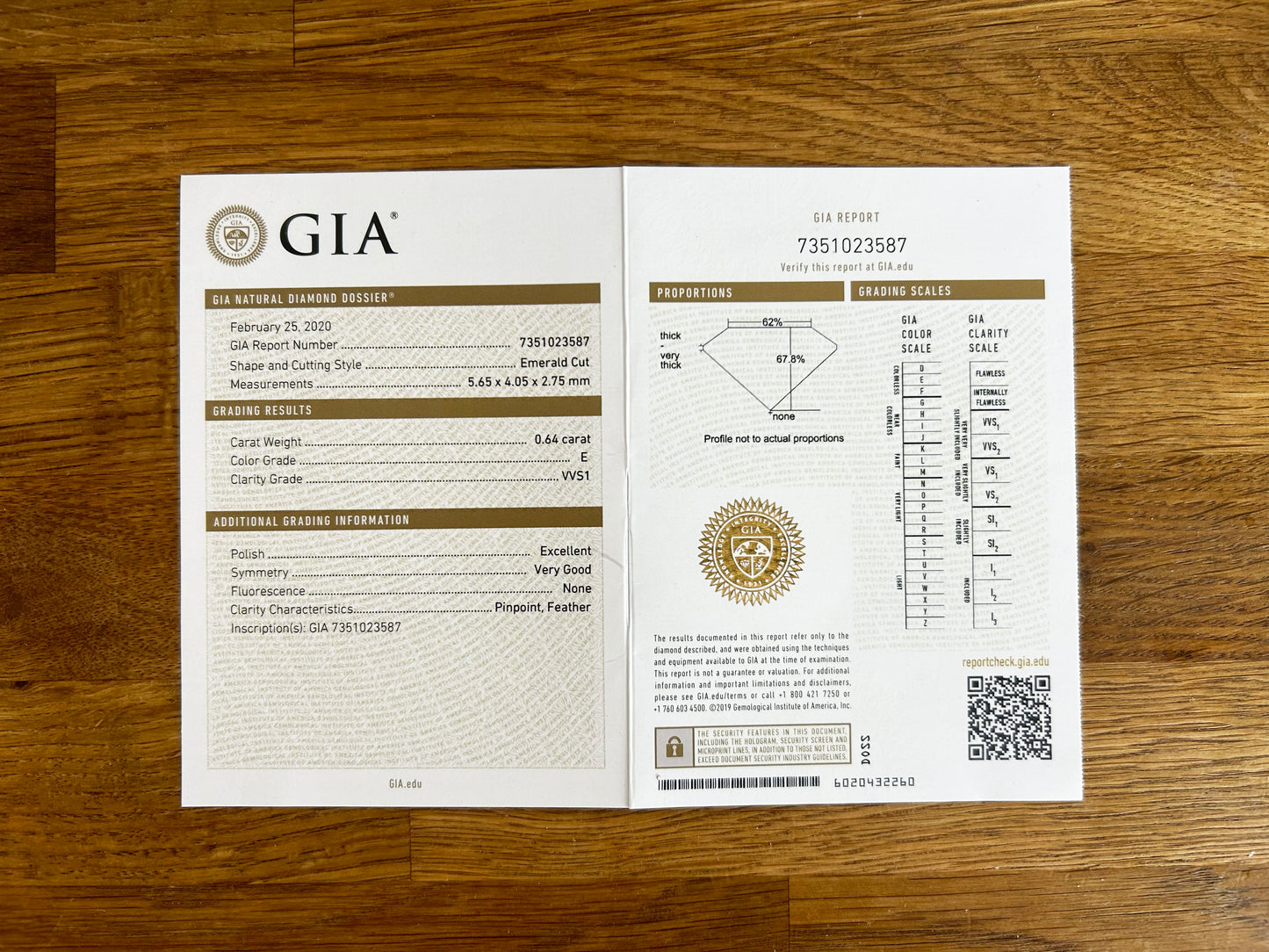 0.64 Carat Emerald Cut Diamond Engagement Ring