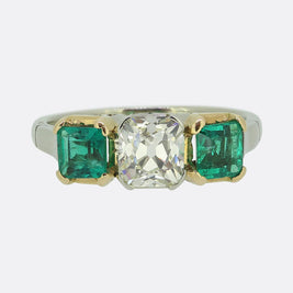 Early 20th Century 1.30 Carat Diamond and Emerald Three-Stone Ring