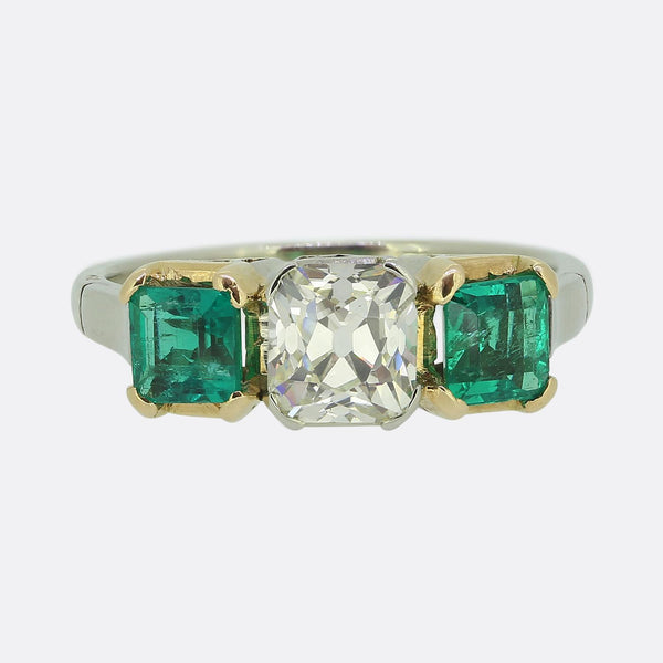 Early 20th Century 1.30 Carat Diamond and Emerald Three-Stone Ring