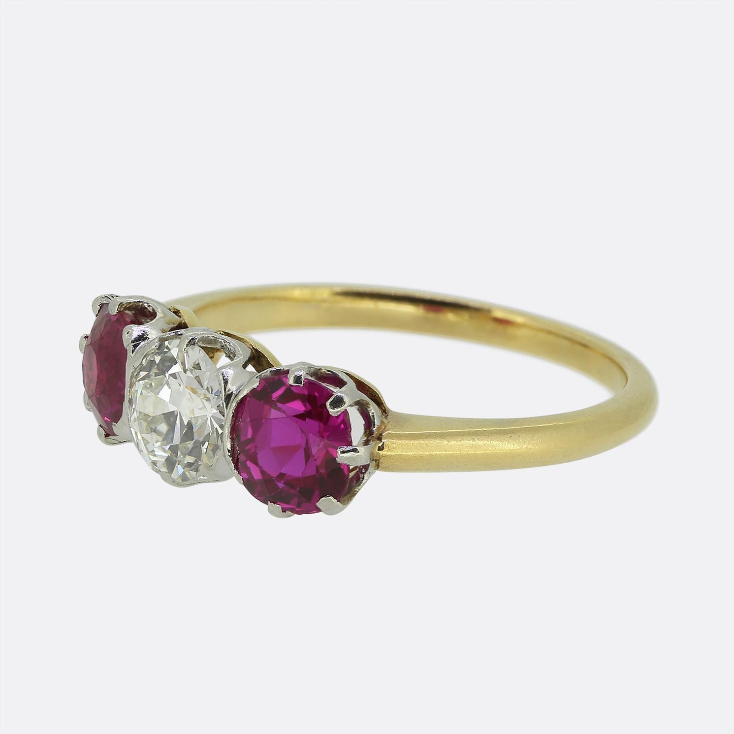 Antique 0.65 Carat Diamond and Ruby Three-Stone Ring