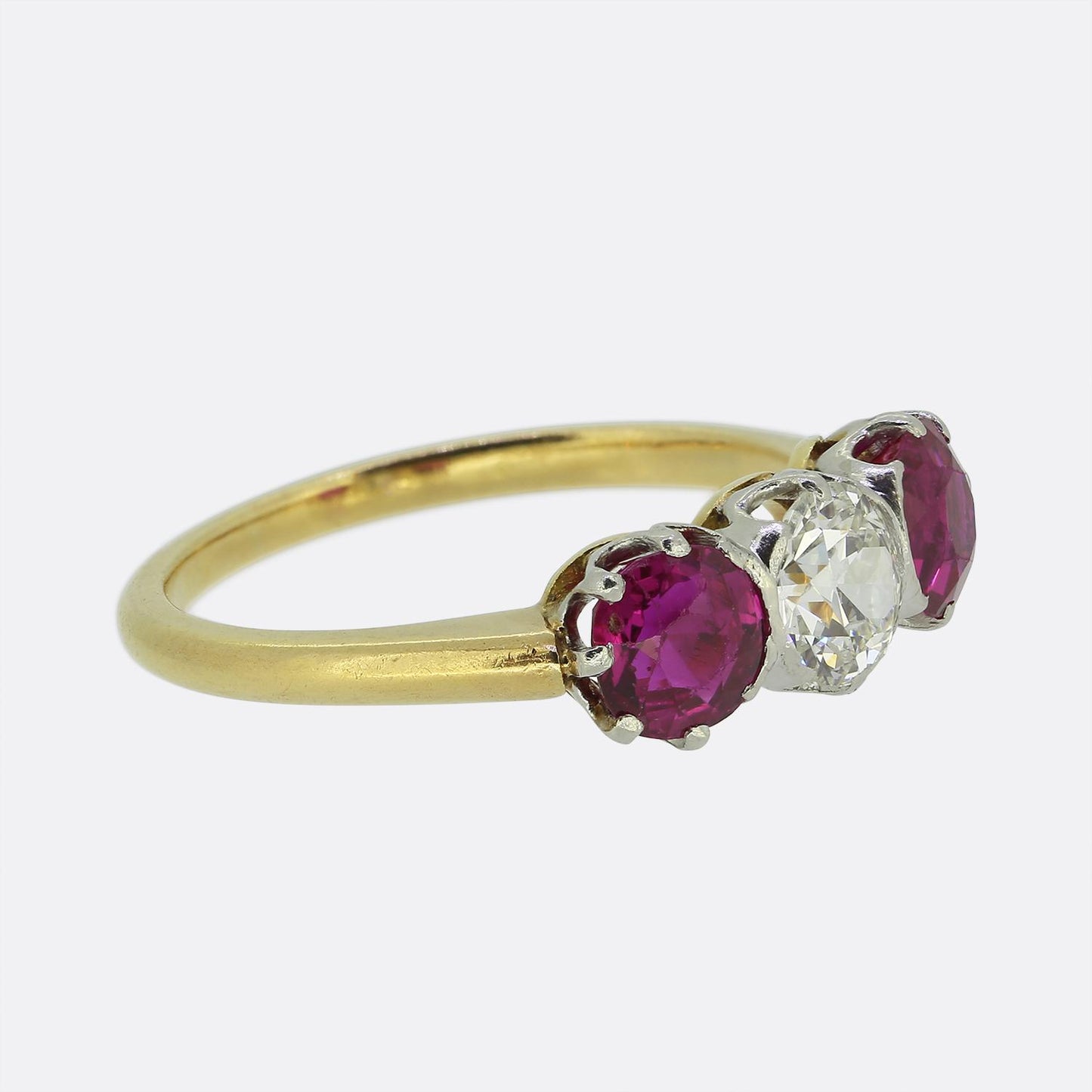 Antique 0.65 Carat Diamond and Ruby Three-Stone Ring