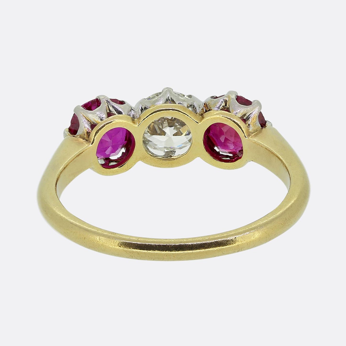 Antique 0.65 Carat Diamond and Ruby Three-Stone Ring