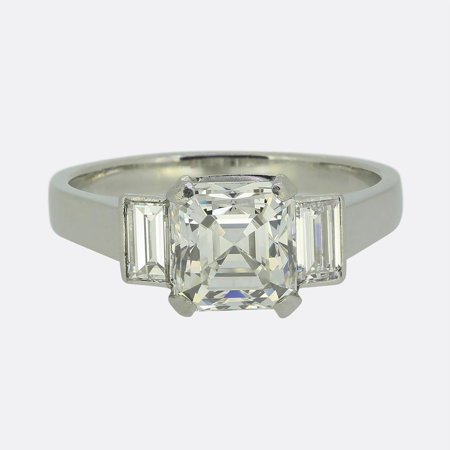 2.33 Carat Asscher Cut Diamond and Baguette Cut Diamond Three-Stone Ring