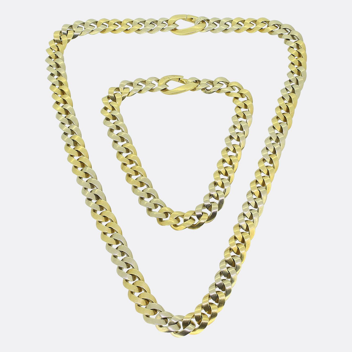 Pomellato Two Tone Curb Chain Necklace and Bracelet Set