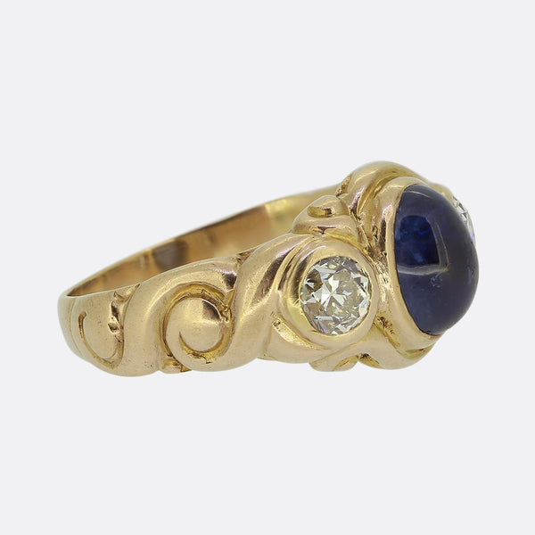 Antique Cabochon Sapphire and Diamond Three-Stone Ring