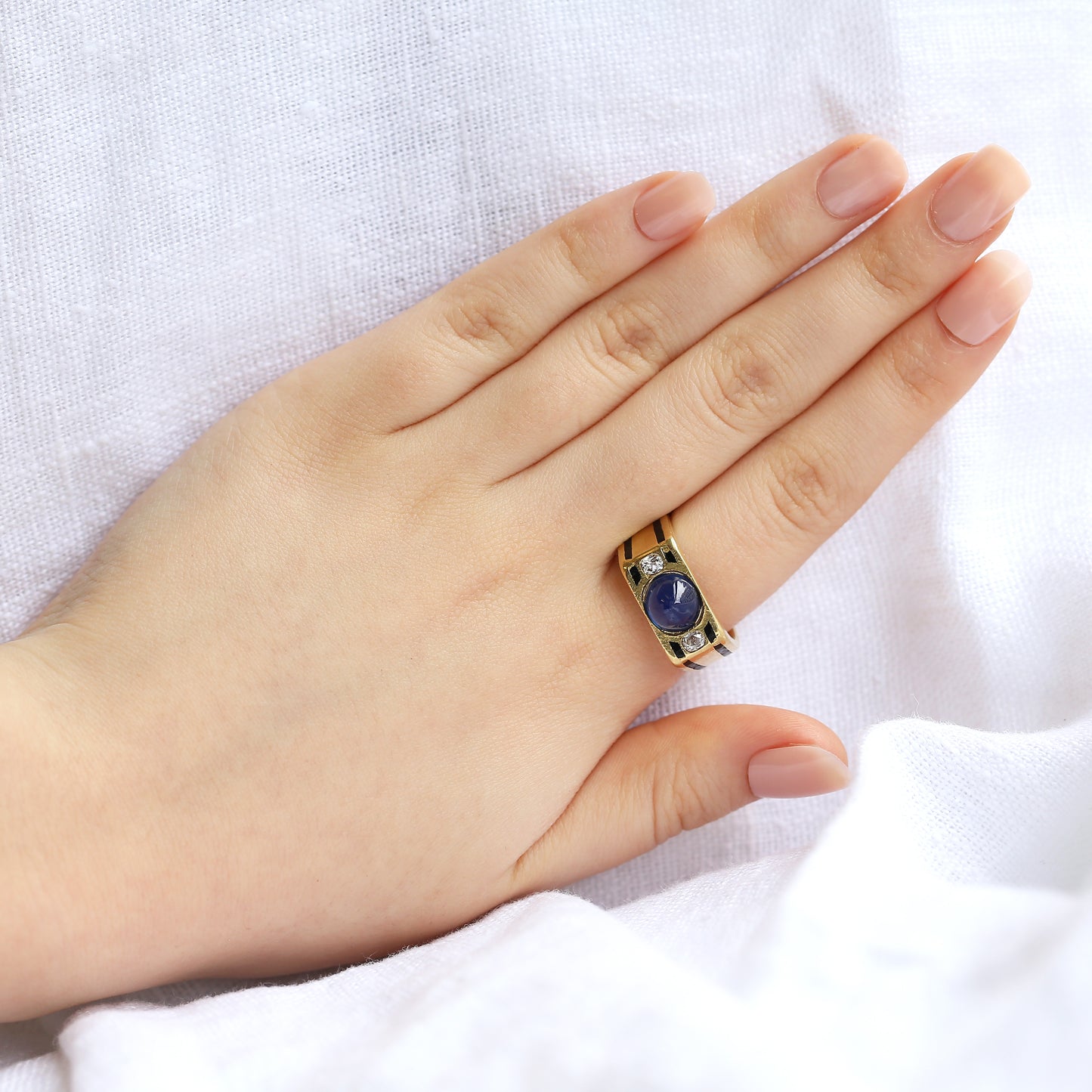 French Art Deco Cabochon Sapphire and Diamond Three-Stone Ring