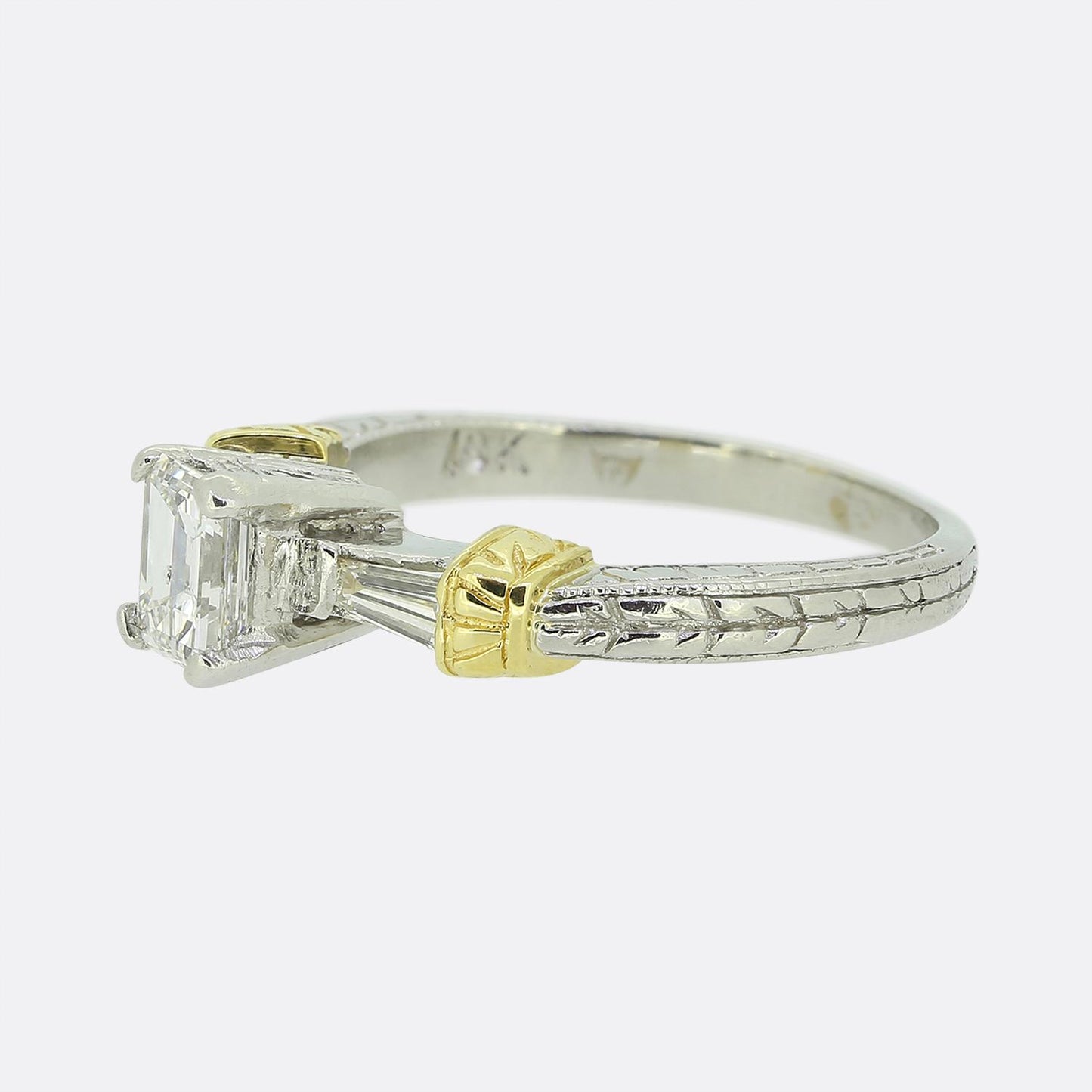 0.64 Carat Emerald Cut Diamond Engagement Ring
