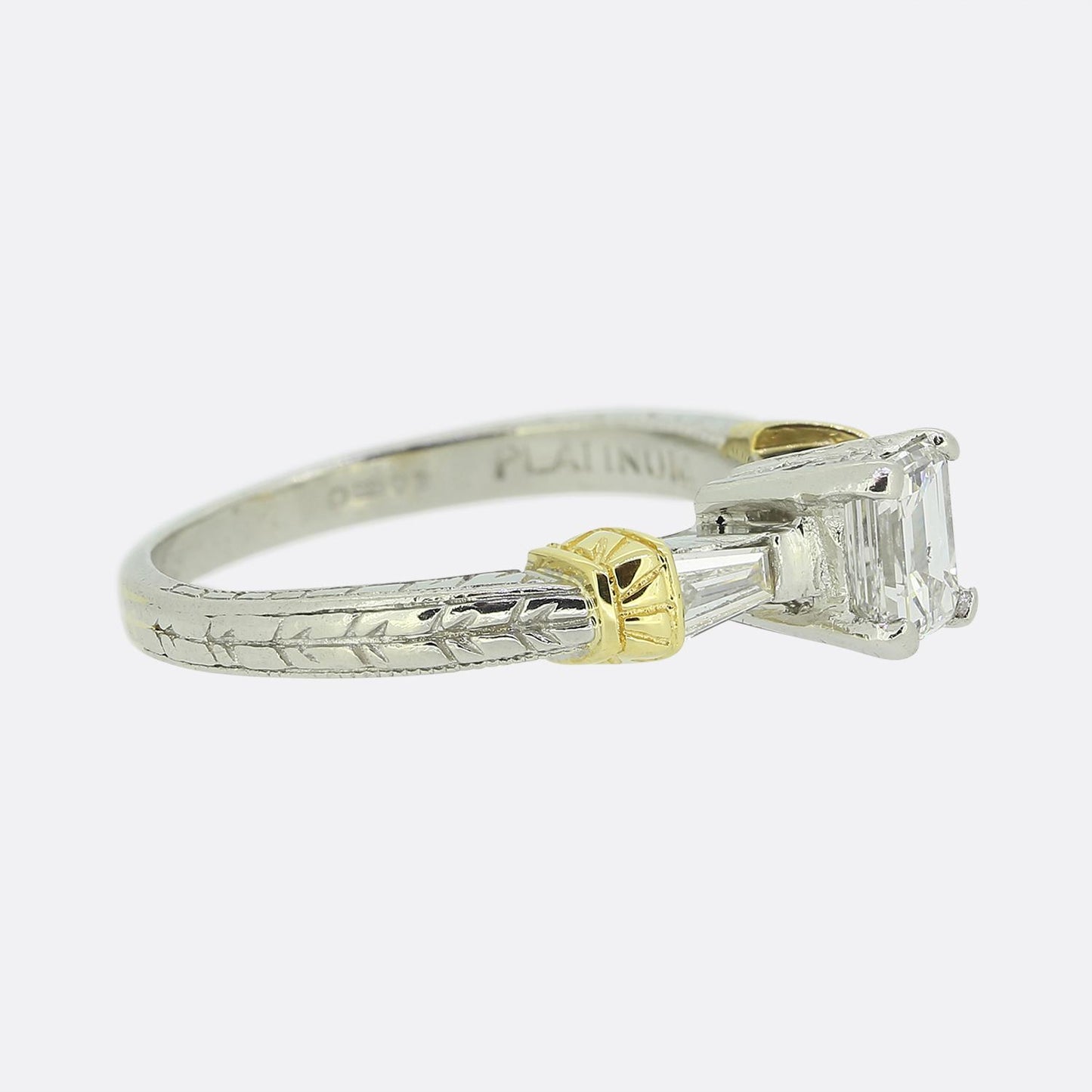 0.64 Carat Emerald Cut Diamond Engagement Ring