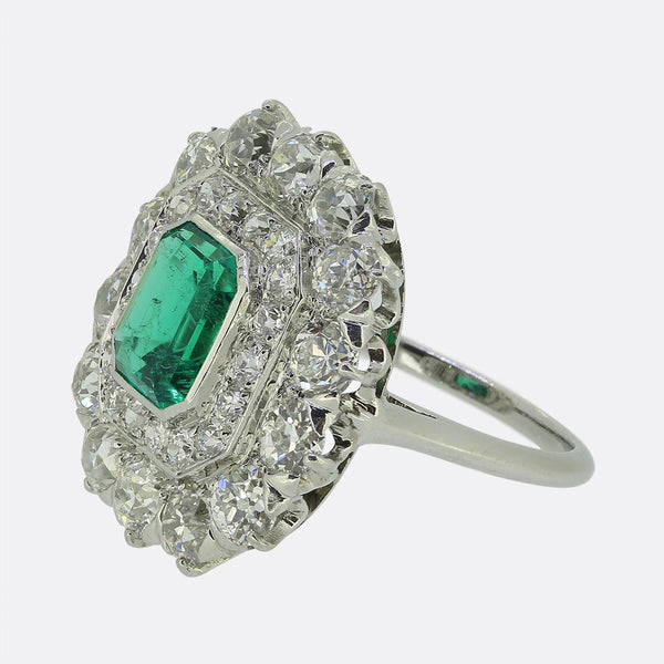 Antique 1.20 Carat Emerald and Diamond Cluster Ring
