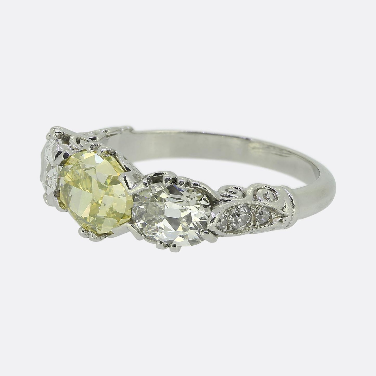 Early 20th Century Vivid Yellow Green Diamond Three-Stone Ring