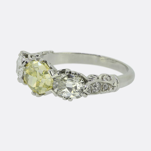 Early 20th Century Vivid Yellow Green Diamond Three-Stone Ring