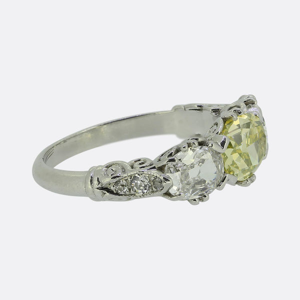 Early 20th Century Vivid Yellow Green Diamond Three-Stone Ring
