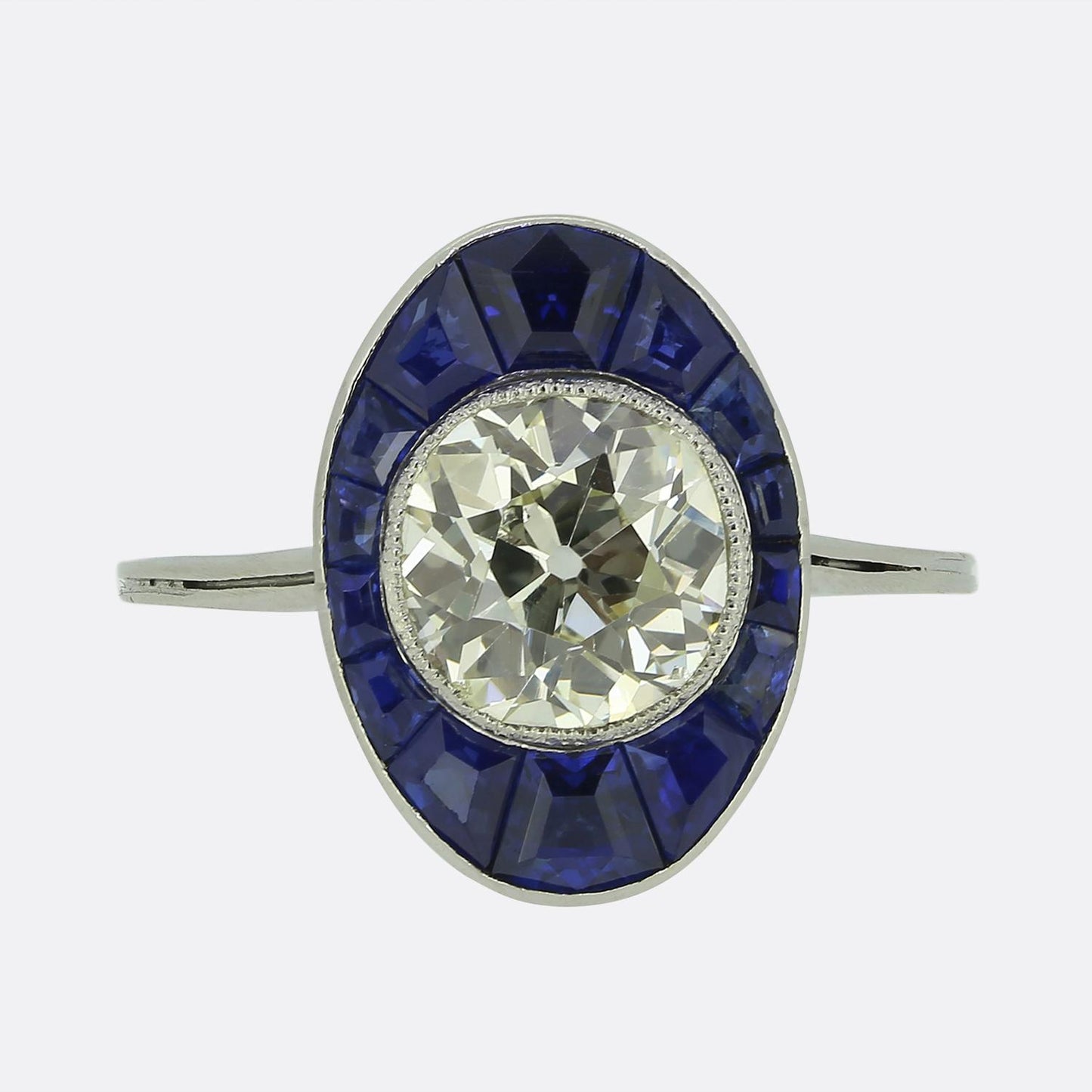Art Deco 1.60 Carat Diamond and Sapphire Cluster Ring