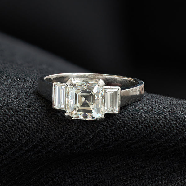 2.33 Carat Asscher Cut Diamond and Baguette Cut Diamond Three-Stone Ring