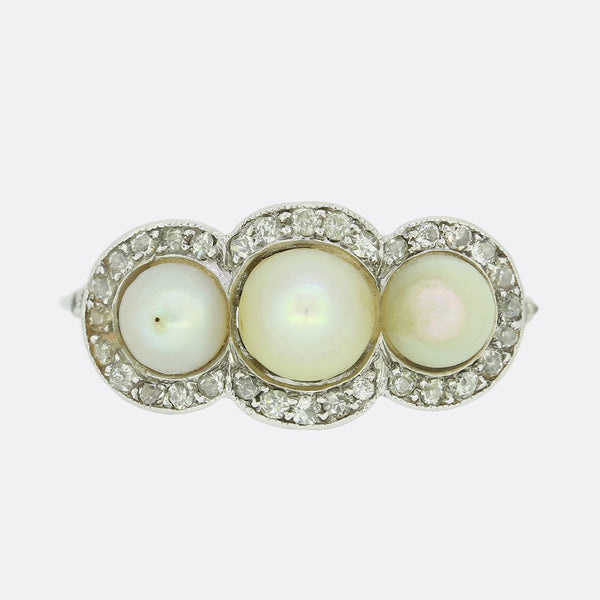 Edwardian Natural Pearl Three Stone and Diamond Ring