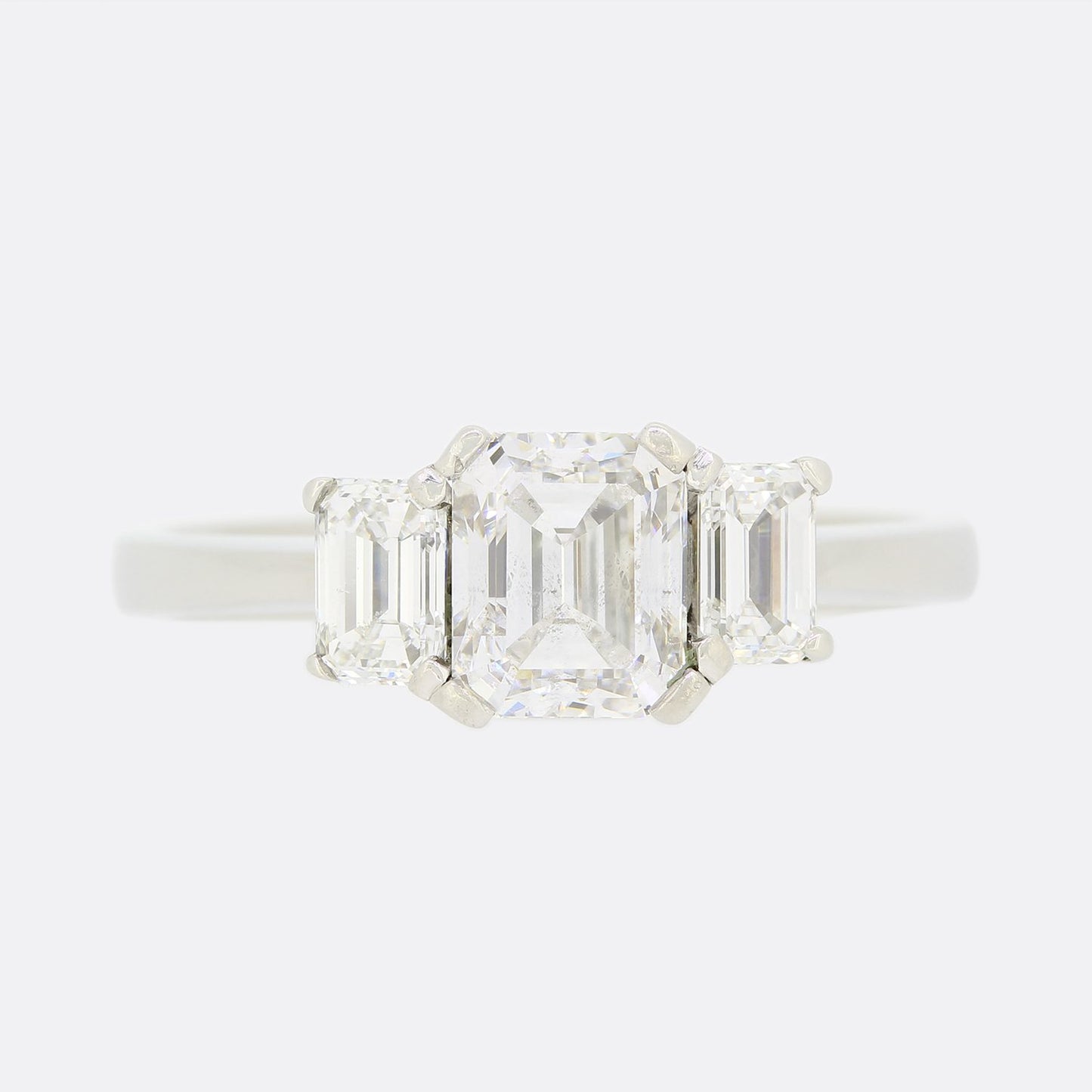 1.50 Carat Emerald Cut Diamond Three Stone Engagement Ring