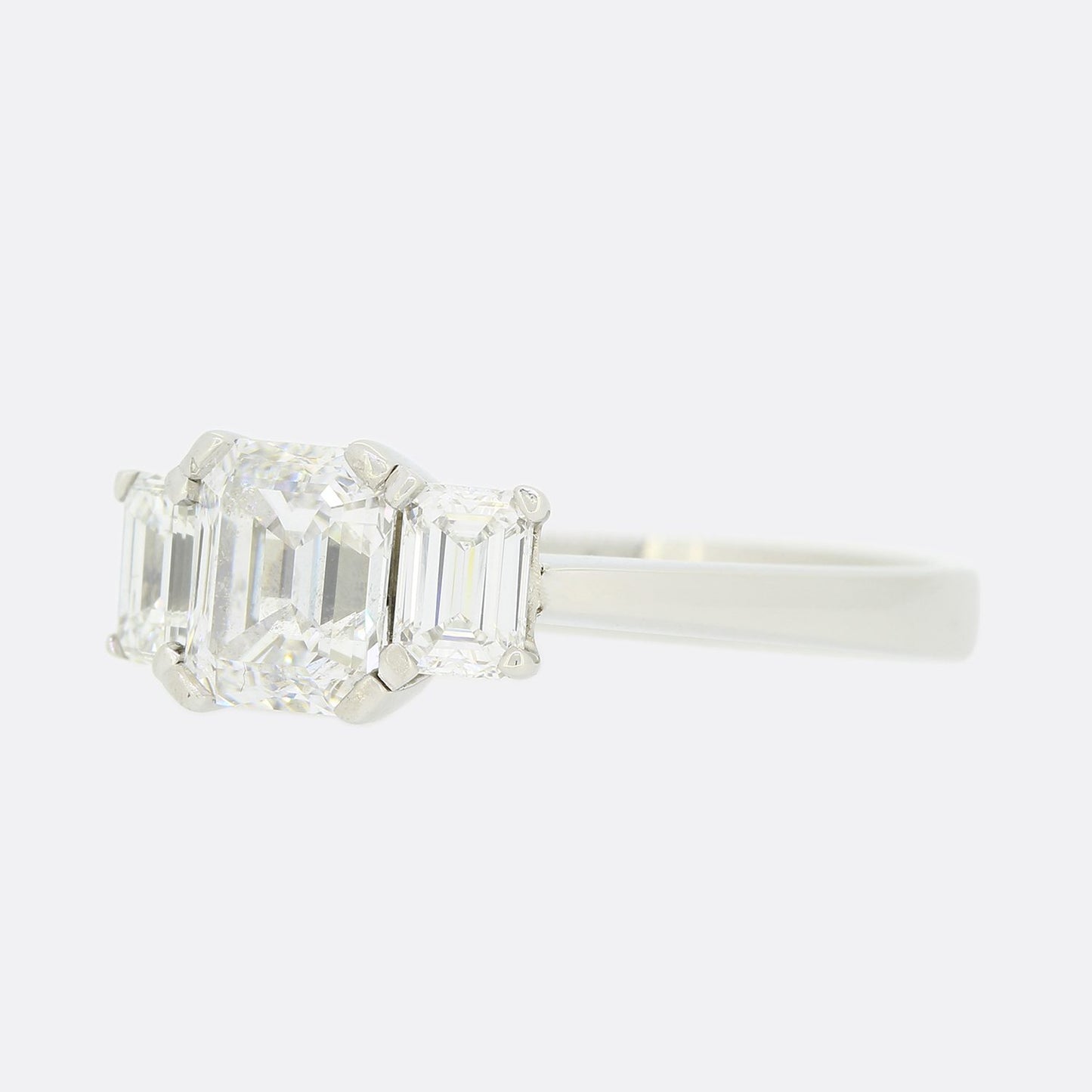 1.50 Carat Emerald Cut Diamond Three Stone Engagement Ring