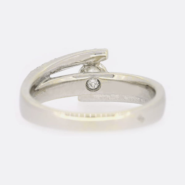 Brilliant Cut Diamond Crossover Solitaire Engagement Ring