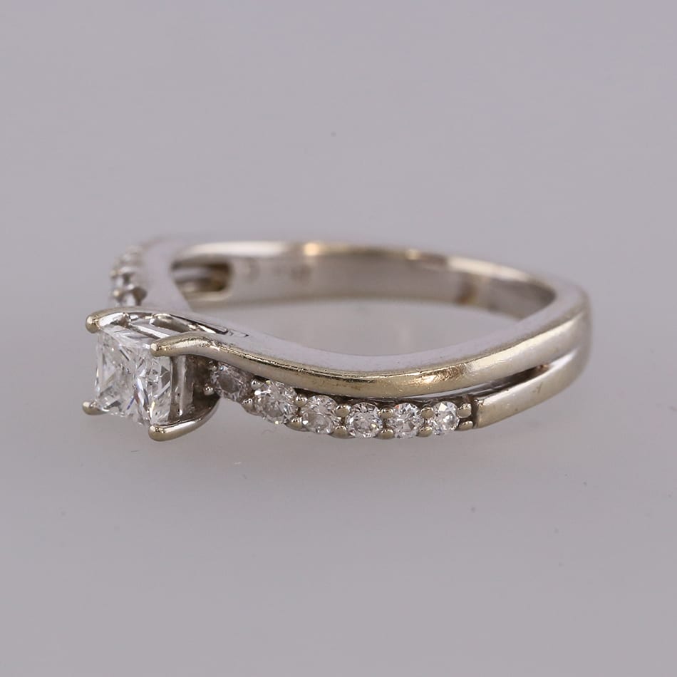 0.25 Carat Diamond Twisted Solitaire Engagement Ring