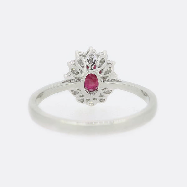 0.54 Carat Oval Ruby and Diamond Cluster Ring